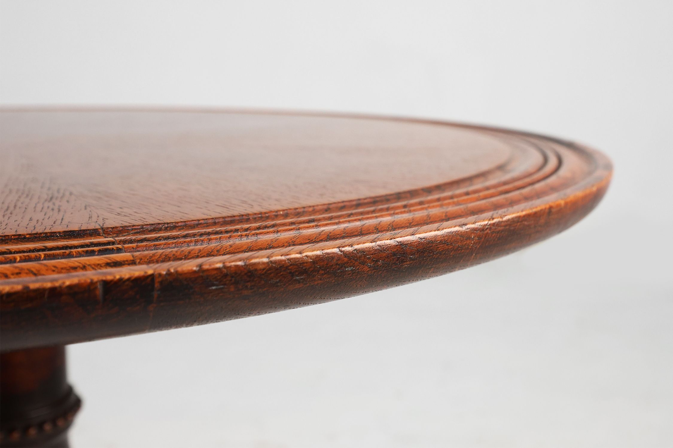 Antique English hand carved circular oak side table with lions head feet thumbnail